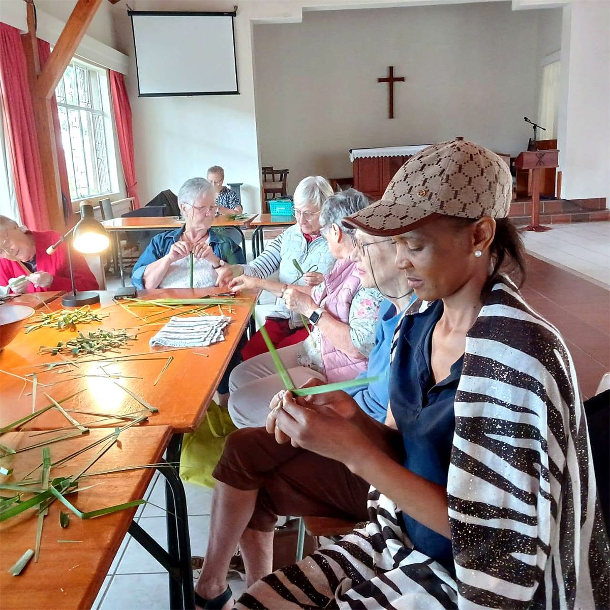 Ladies Fellowship members making palm crosses