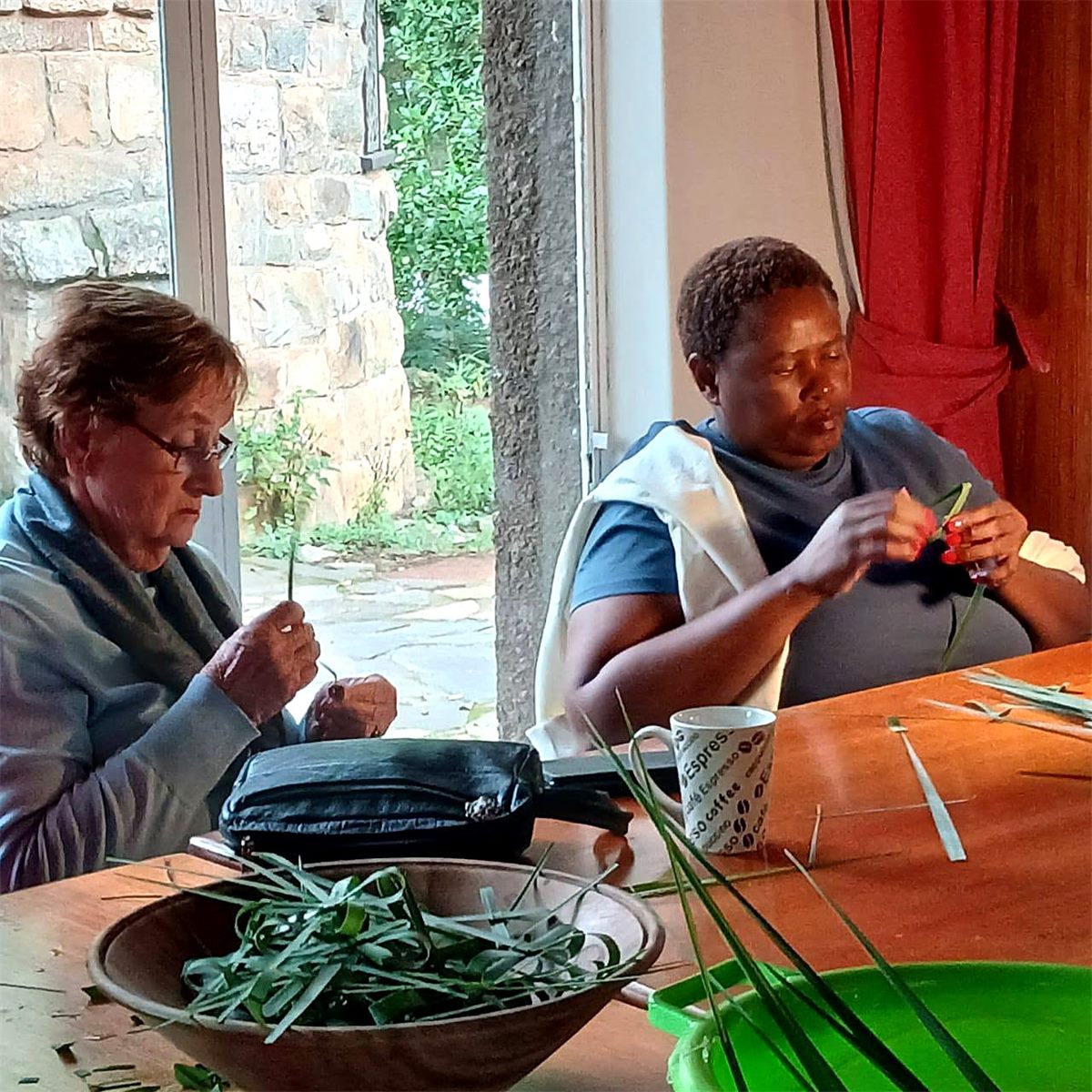 Ladies Fellowship members weaving palm leaves